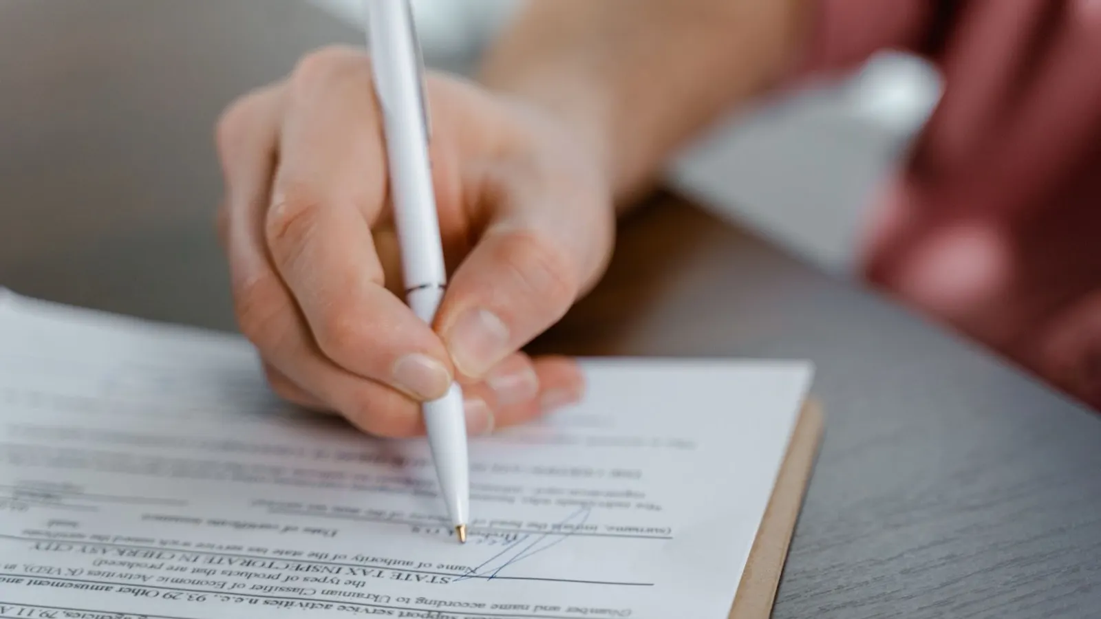 Signing a document — the EU declaration of conformity is signed off under own responsibility